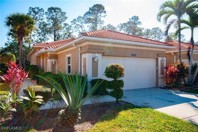 view of side of home featuring a garage