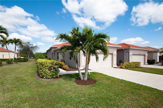 view of front facade with a garage, concrete driveway, a tiled roof, stucco siding, and a front lawn