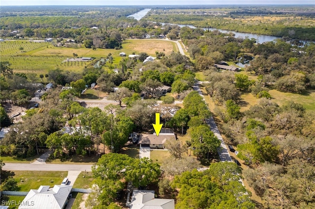 aerial view featuring a water view and a rural view