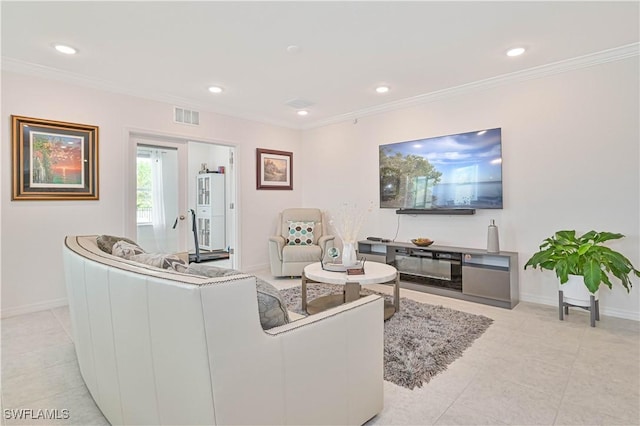 tiled living room with ornamental molding