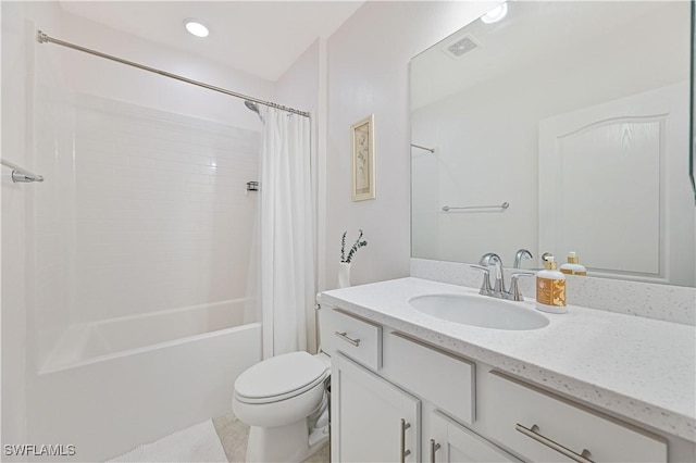 full bathroom featuring shower / tub combo with curtain, vanity, and toilet