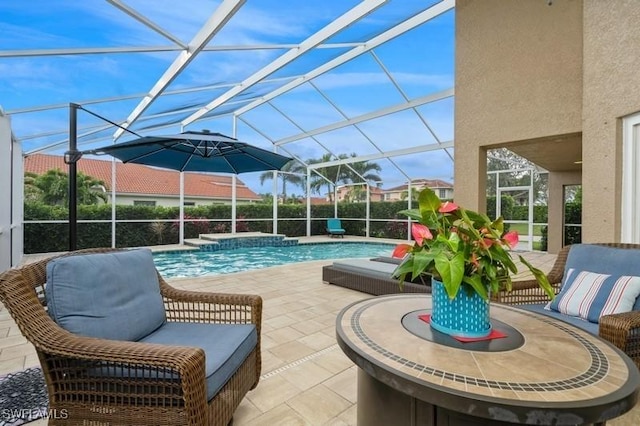 view of patio featuring a lanai and an outdoor pool