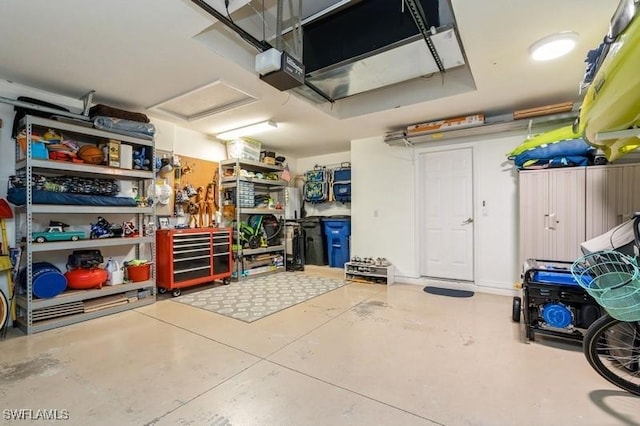 garage featuring a garage door opener