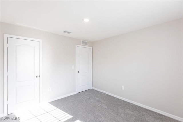 view of carpeted spare room