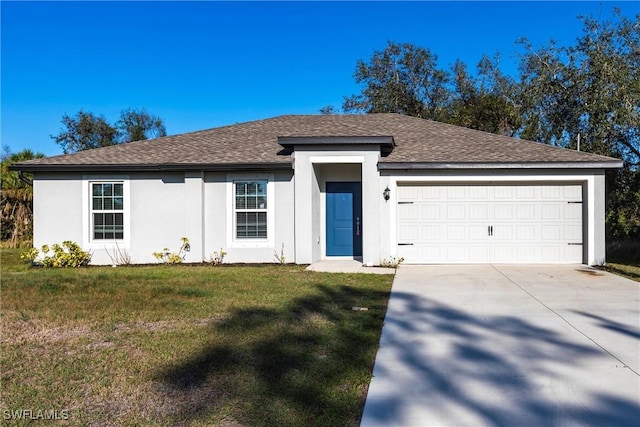 ranch-style home with a garage and a front lawn