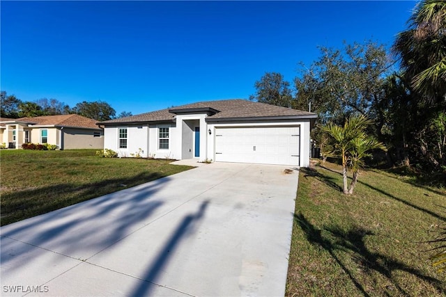 ranch-style home featuring a garage and a front lawn