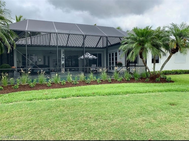 view of home's community featuring a yard