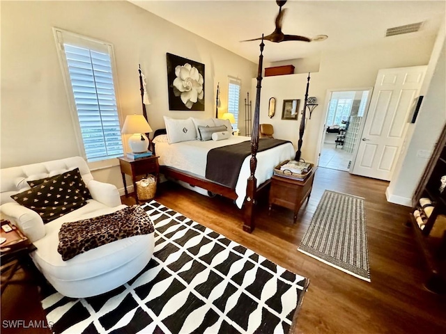 bedroom featuring dark wood-type flooring