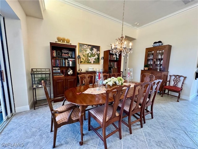 tiled dining area featuring ornamental molding and an inviting chandelier