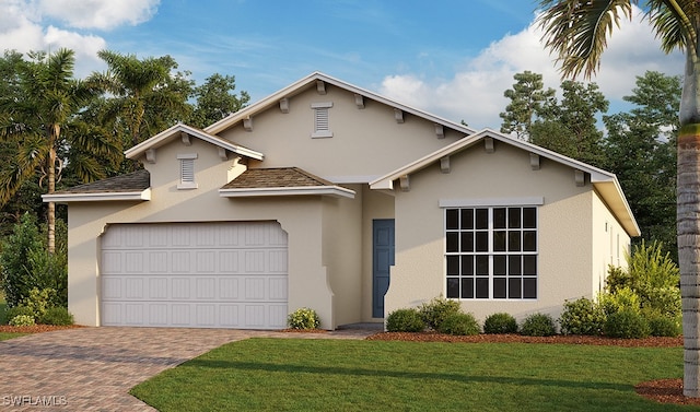 view of front of house with a garage, decorative driveway, a front yard, and stucco siding