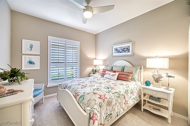 bedroom with ceiling fan and carpet