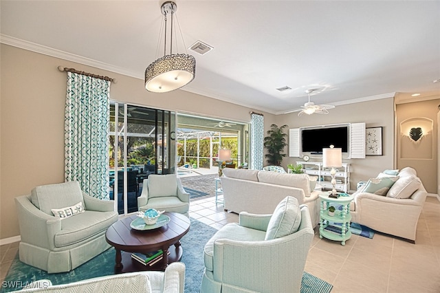 tiled living room with ornamental molding and ceiling fan