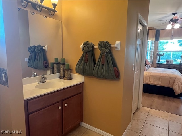bathroom with vanity, tile patterned floors, and ceiling fan