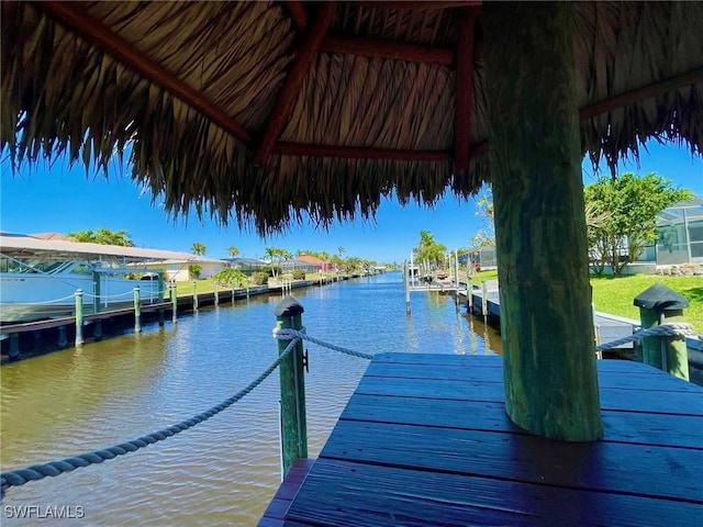 dock area featuring a water view