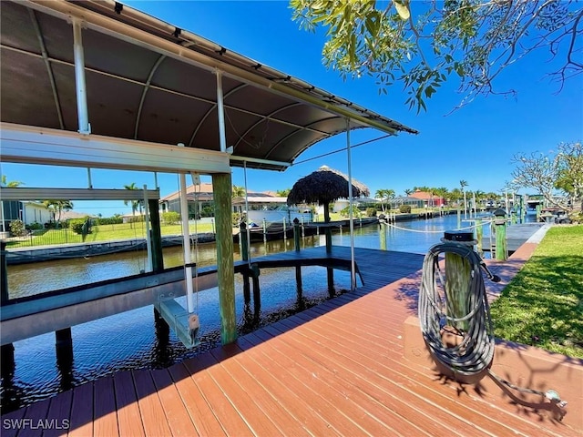 dock area featuring a water view and boat lift