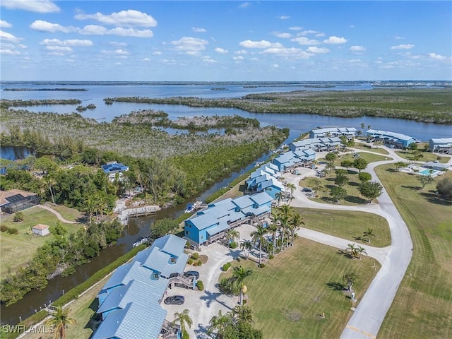 drone / aerial view with a water view