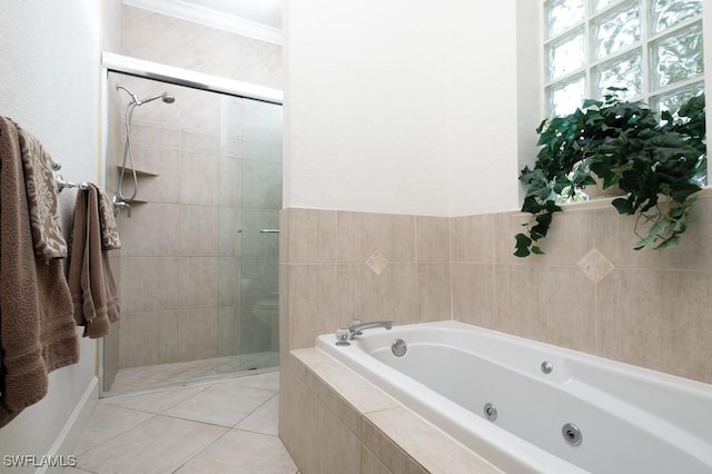704 107th Ave N, Naples, FL 34108 - bathroom featuring a shower stall, a whirlpool tub, and tile patterned floors