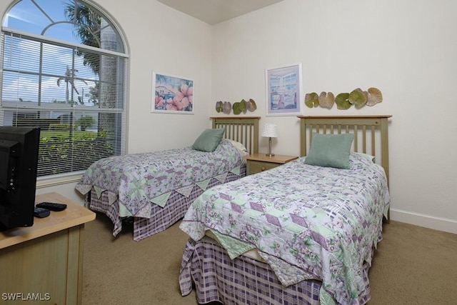 704 107th Ave N, Naples, FL 34108 - carpeted bedroom featuring baseboards
