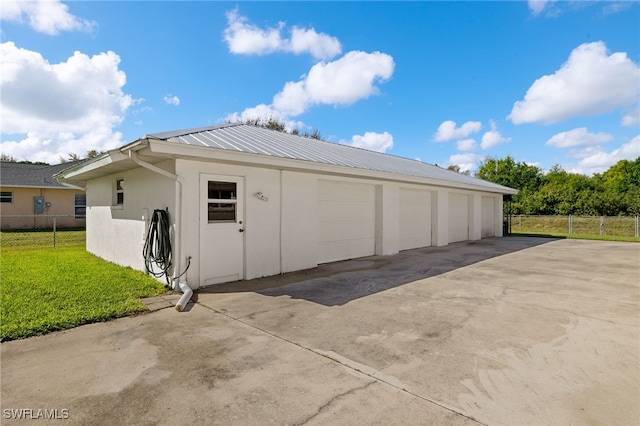 detached garage with fence