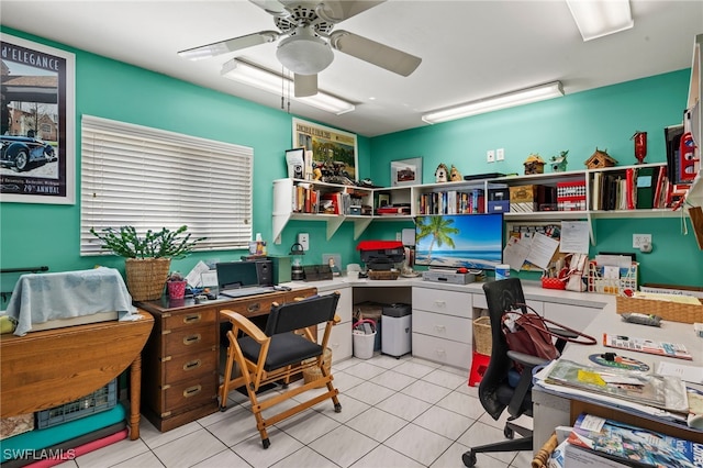 home office with ceiling fan and light tile patterned floors