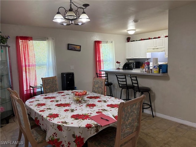 dining area with a chandelier