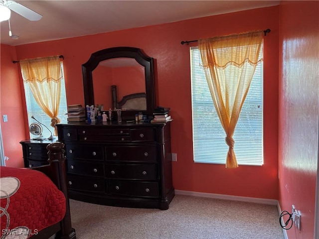 bedroom featuring light colored carpet