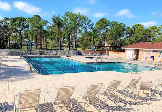 view of swimming pool with a patio area