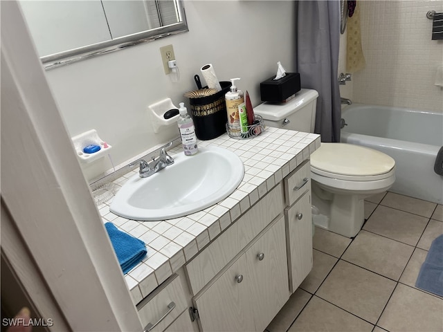 full bathroom featuring shower / tub combo with curtain, vanity, toilet, and tile patterned flooring