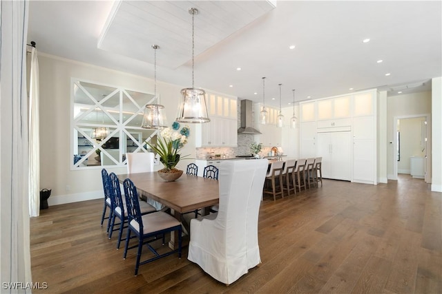 dining room with dark hardwood / wood-style floors