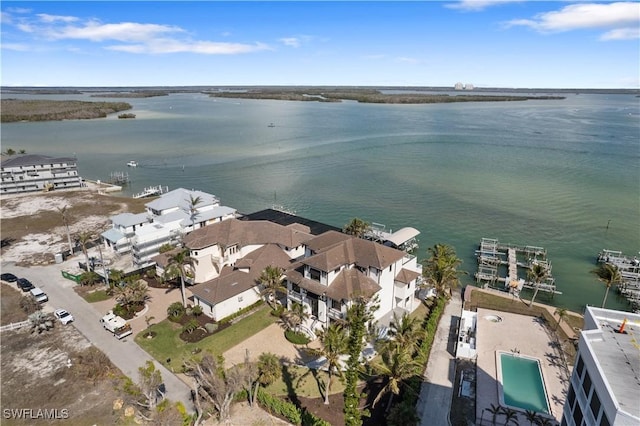 drone / aerial view with a water view