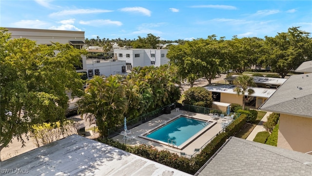 view of pool with a residential view