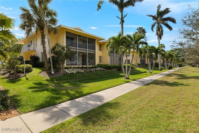 exterior space featuring a lawn