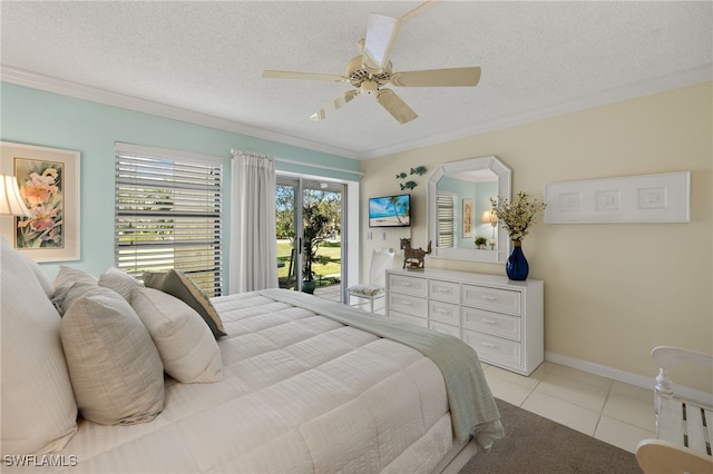 bedroom with light tile patterned floors, a textured ceiling, a ceiling fan, baseboards, and crown molding