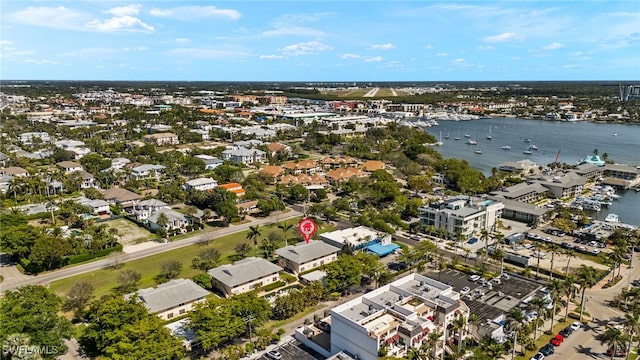 bird's eye view featuring a residential view and a water view