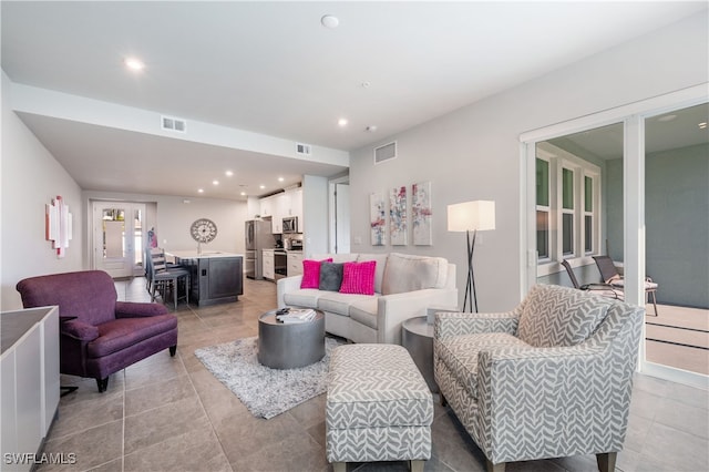 4688 Arboretum Cir Unit 102, Naples, FL 34112 - living area featuring recessed lighting and light tile patterned floors