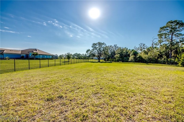 view of yard with a rural view