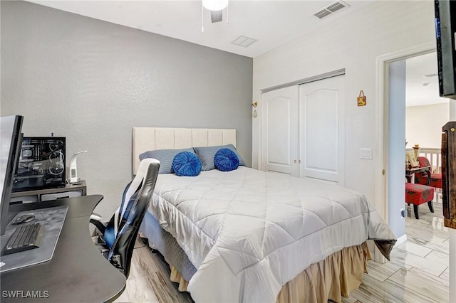 bedroom featuring a closet and ceiling fan