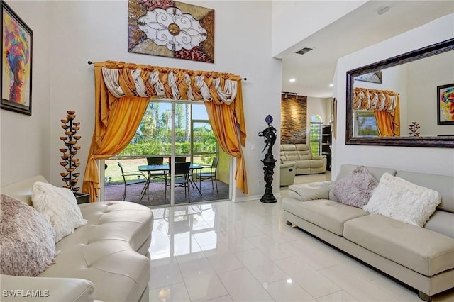 living room with tile patterned flooring