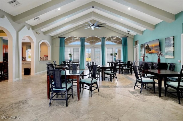 dining room with beamed ceiling, ceiling fan, and high vaulted ceiling