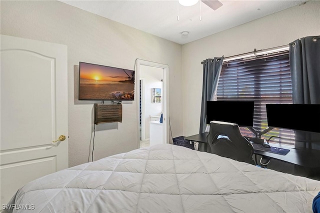 bedroom featuring ensuite bathroom and ceiling fan