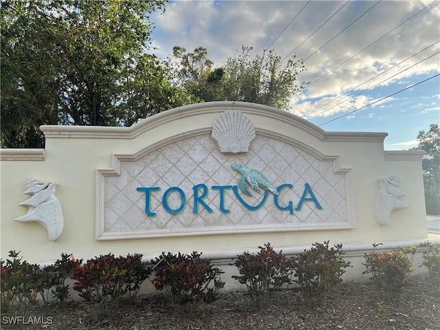 view of community sign