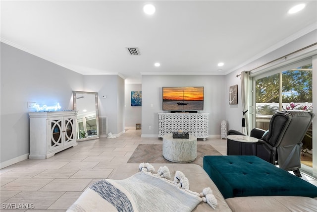 living room featuring crown molding