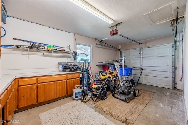 garage featuring a garage door opener