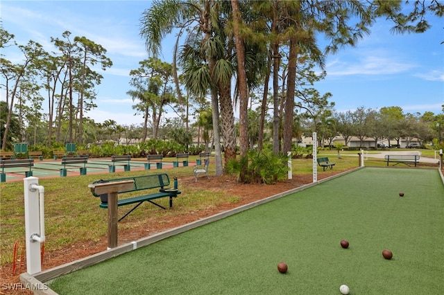 view of home's community featuring a lawn