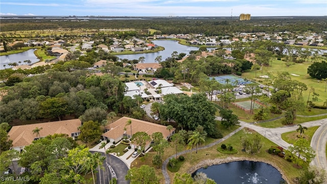 birds eye view of property featuring a water view and a residential view