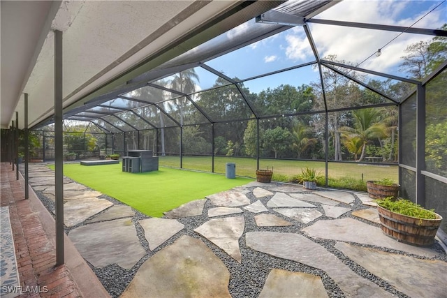 view of patio / terrace with cooling unit and a lanai