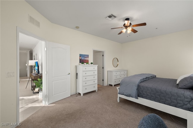 carpeted bedroom featuring ceiling fan