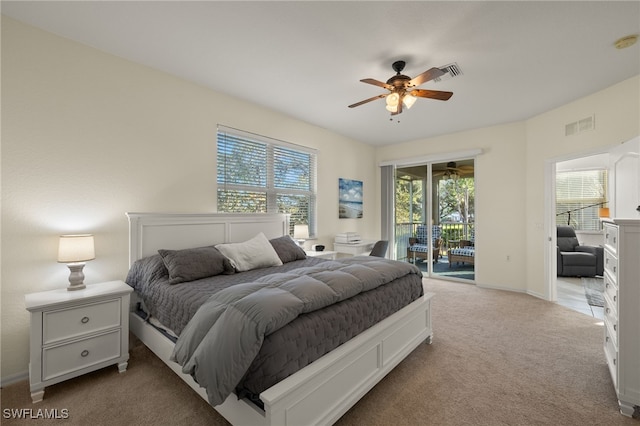 bedroom with light carpet, access to outside, and ceiling fan