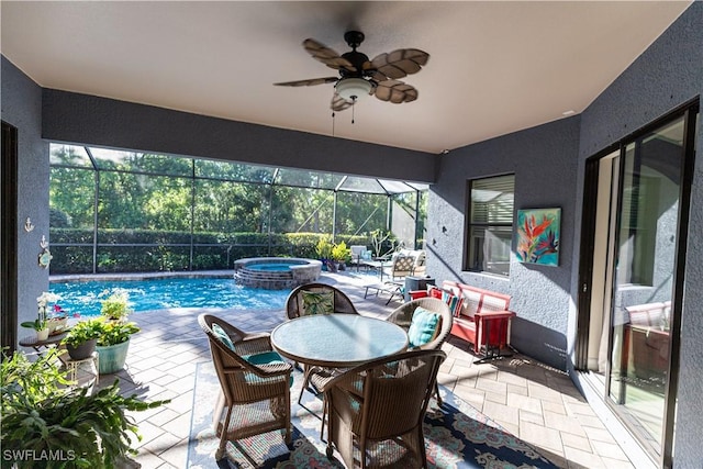 view of pool with ceiling fan