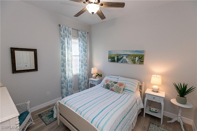 bedroom featuring ceiling fan and light hardwood / wood-style flooring